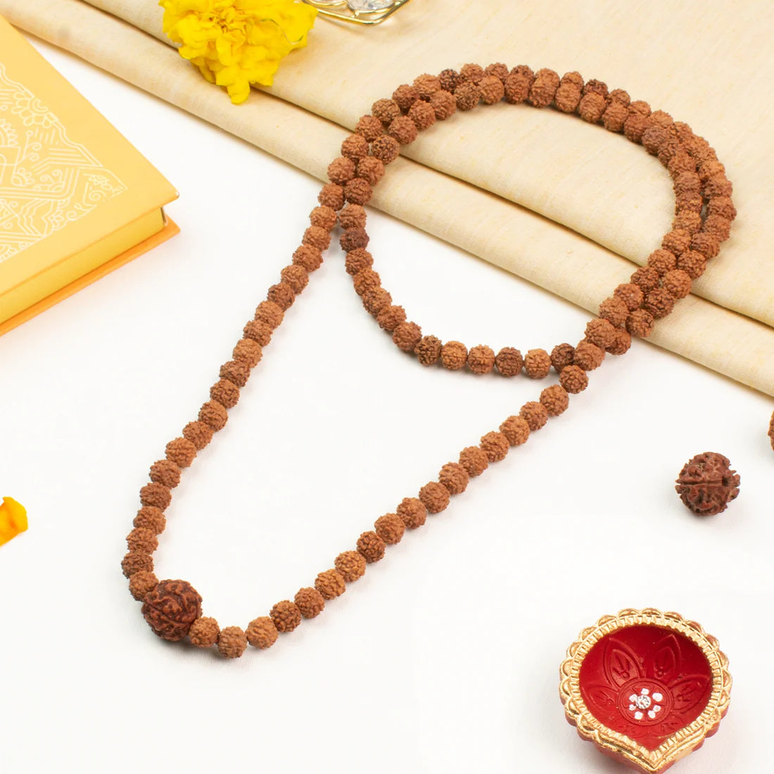 4 Mukhi Rudraksha bead in 5 Mukhi Rudraksha Mala
