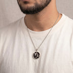 Capricorn Pendant with Garnet