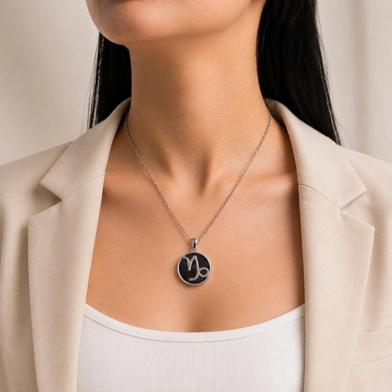 Capricorn Pendant with Garnet